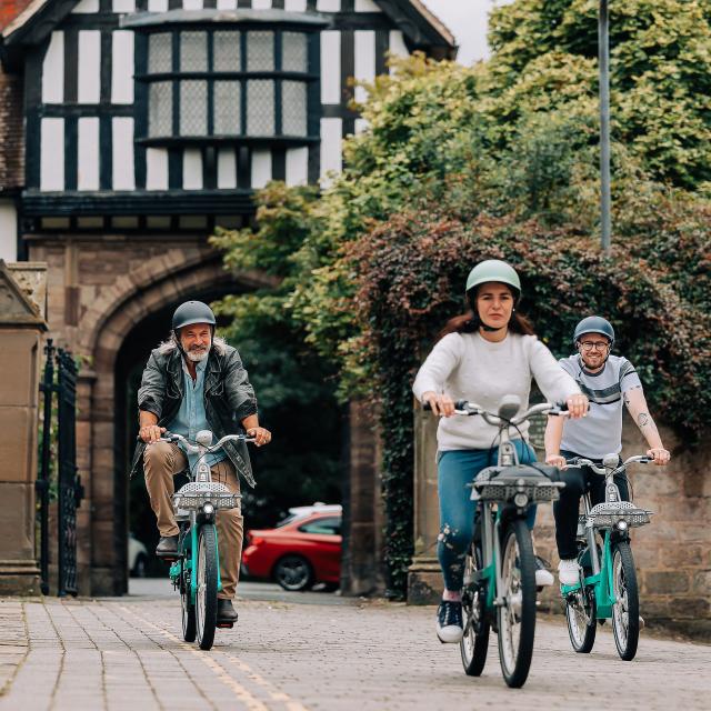 3 cyclists in hereford on the road with helmets on